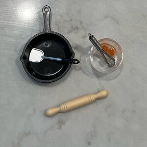 New Barbie Size rolling pin, whisk,pan, spatula, mixing bowl with eggs. Dishes